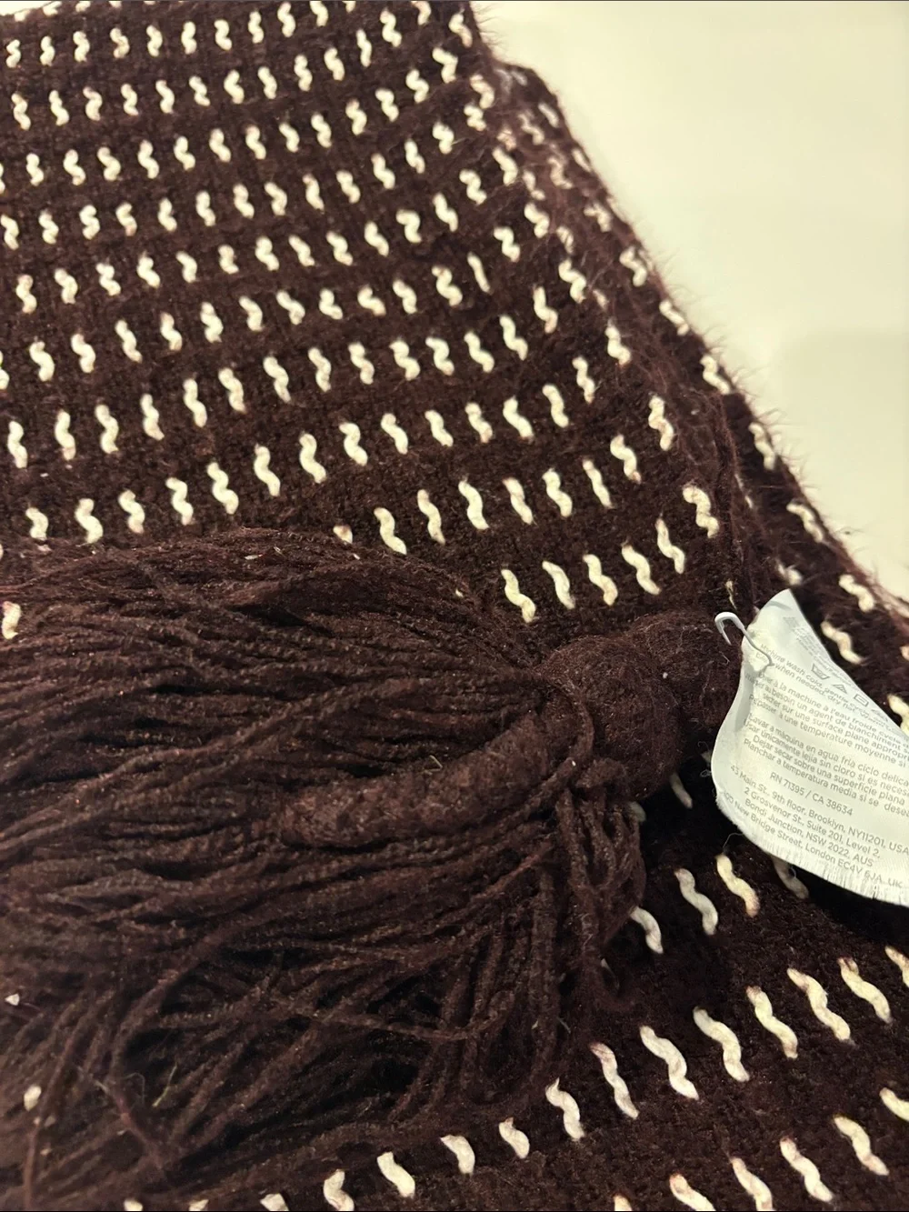 West Elm Burgundy and White Knit throw blanket with Tassels